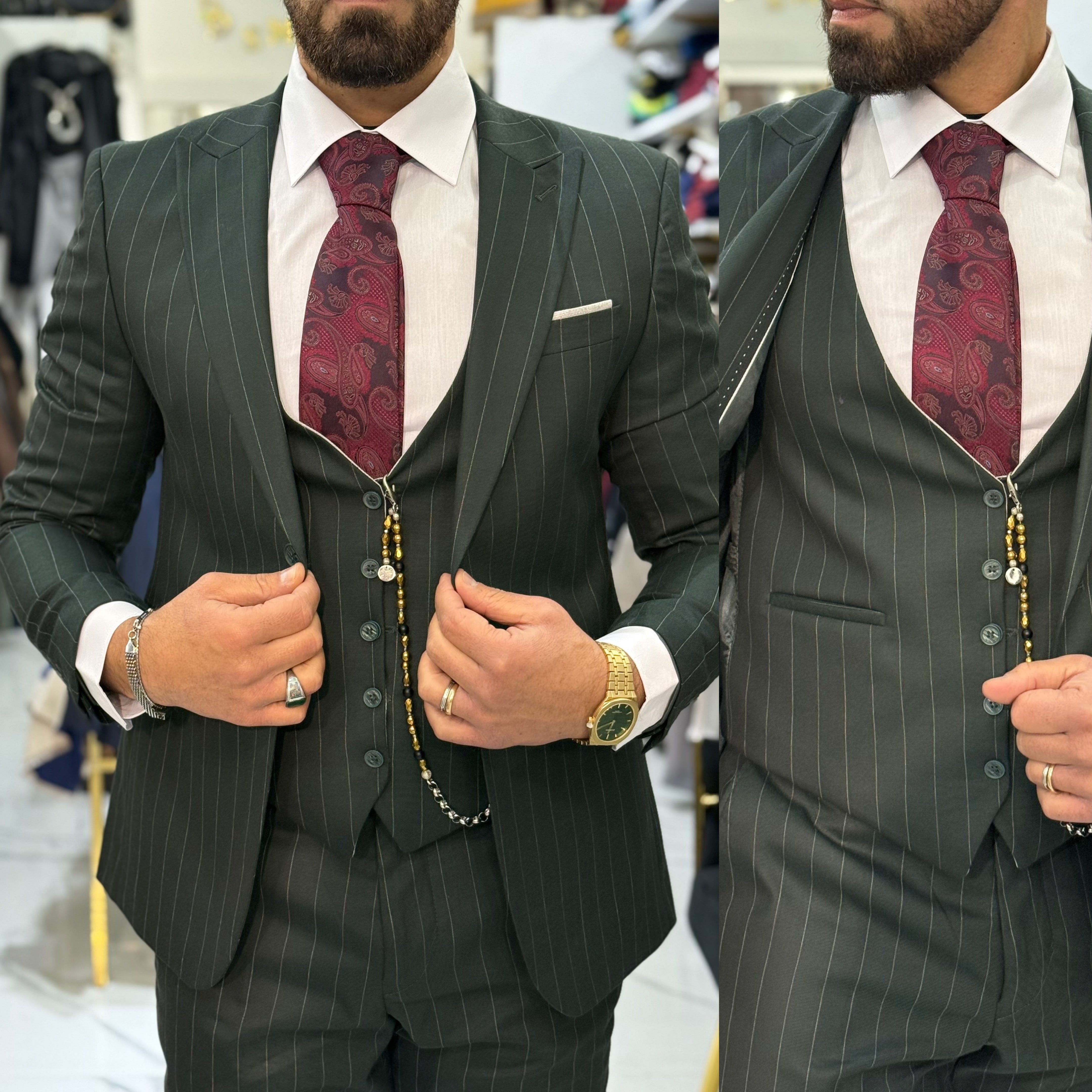 Abito gessato sartoriale giacca pantalone gilet marracash