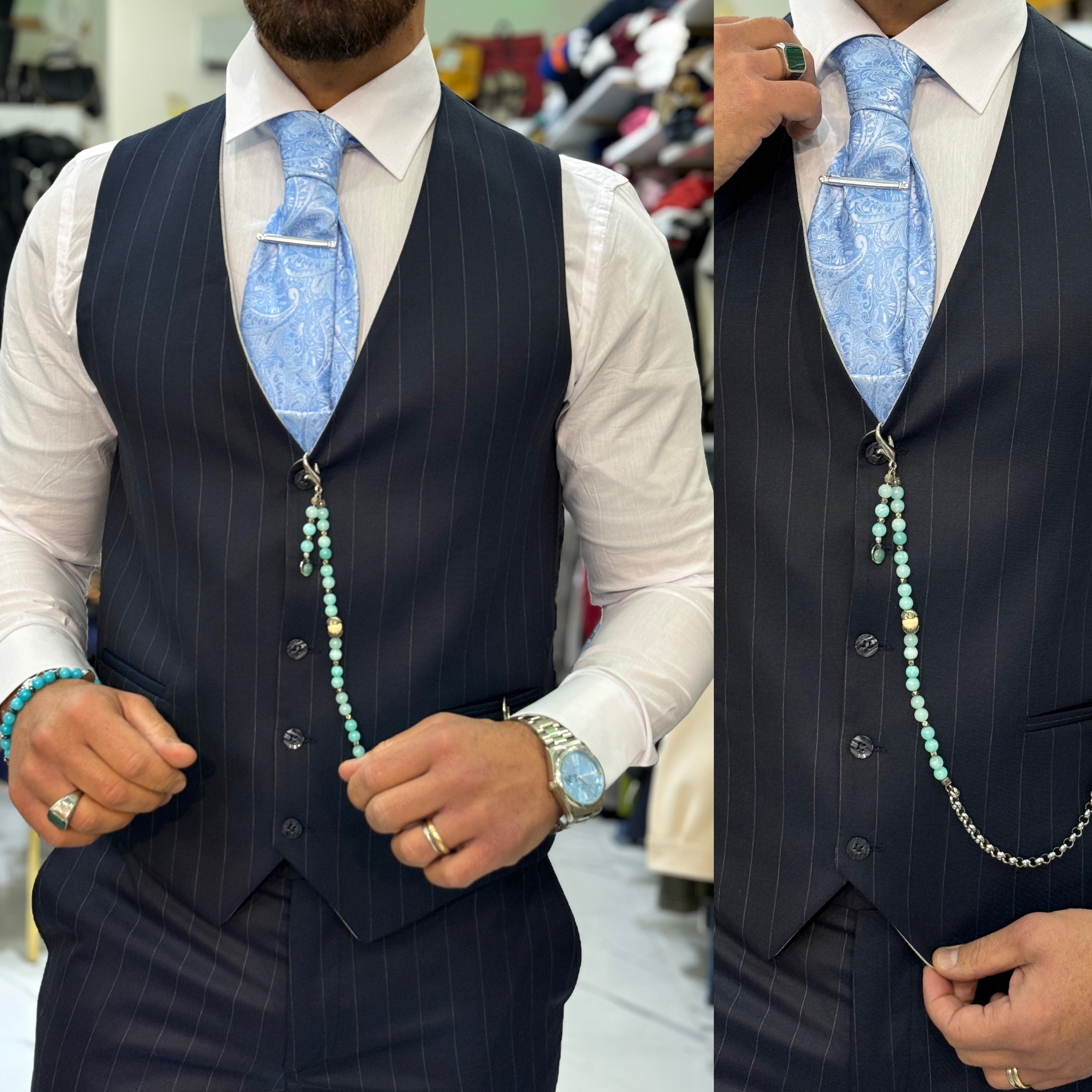 Abito gessato sartoriale giacca pantalone gilet marracash