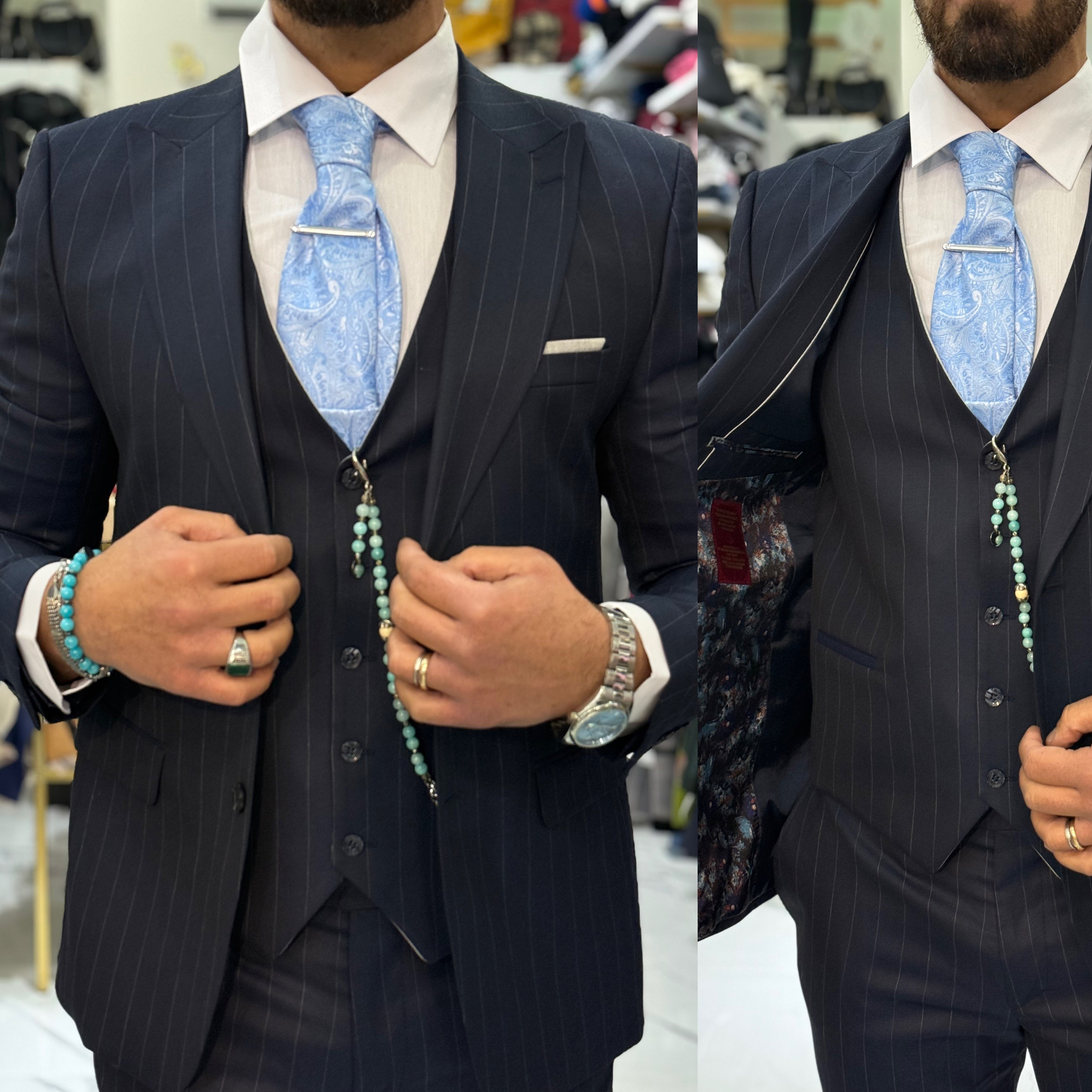 Abito gessato sartoriale giacca pantalone gilet marracash